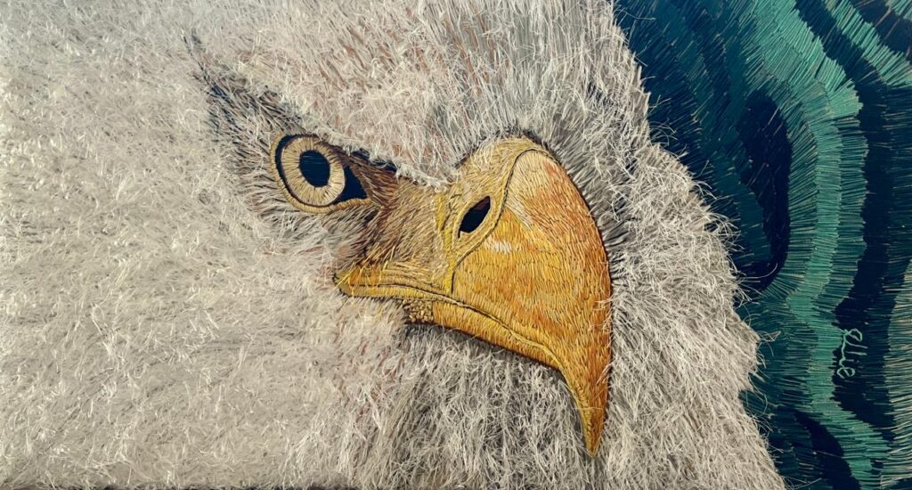 129F, Eagle, Fiber art - silk threads on linen Dimensions: W 31" x H 17" Collection: Private